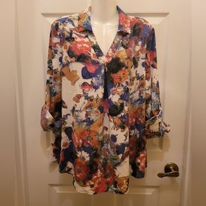 Kelly Clinton colorful blouse